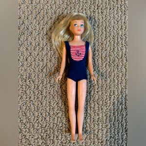 Vintage 1960’s Skipper Doll in original blue swimsuit
